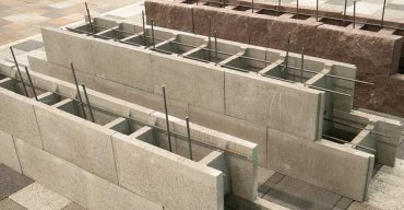 Vigas de concreto representam as vantagens e desvantagens do concreto armado